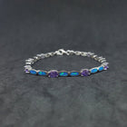 Oval Amethyst with Oval Blue Fire Opal sterling silver link bracelet